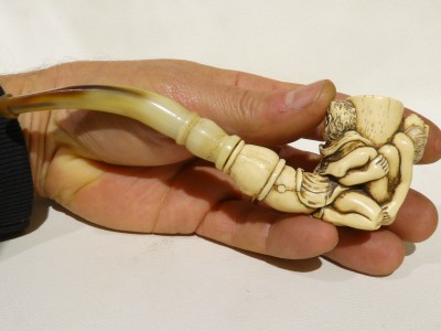 Oriental pipe with erotic scene
